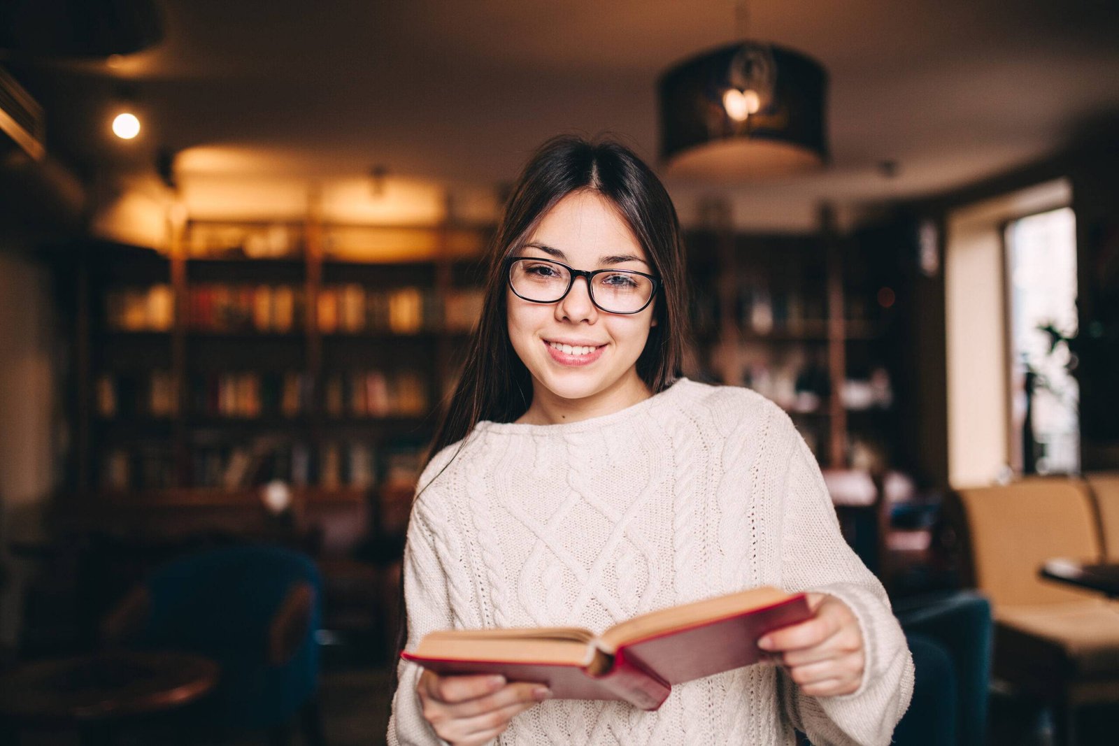 portrait-of-a-beautiful-student-in-library-2023-11-27-04-58-26-utc