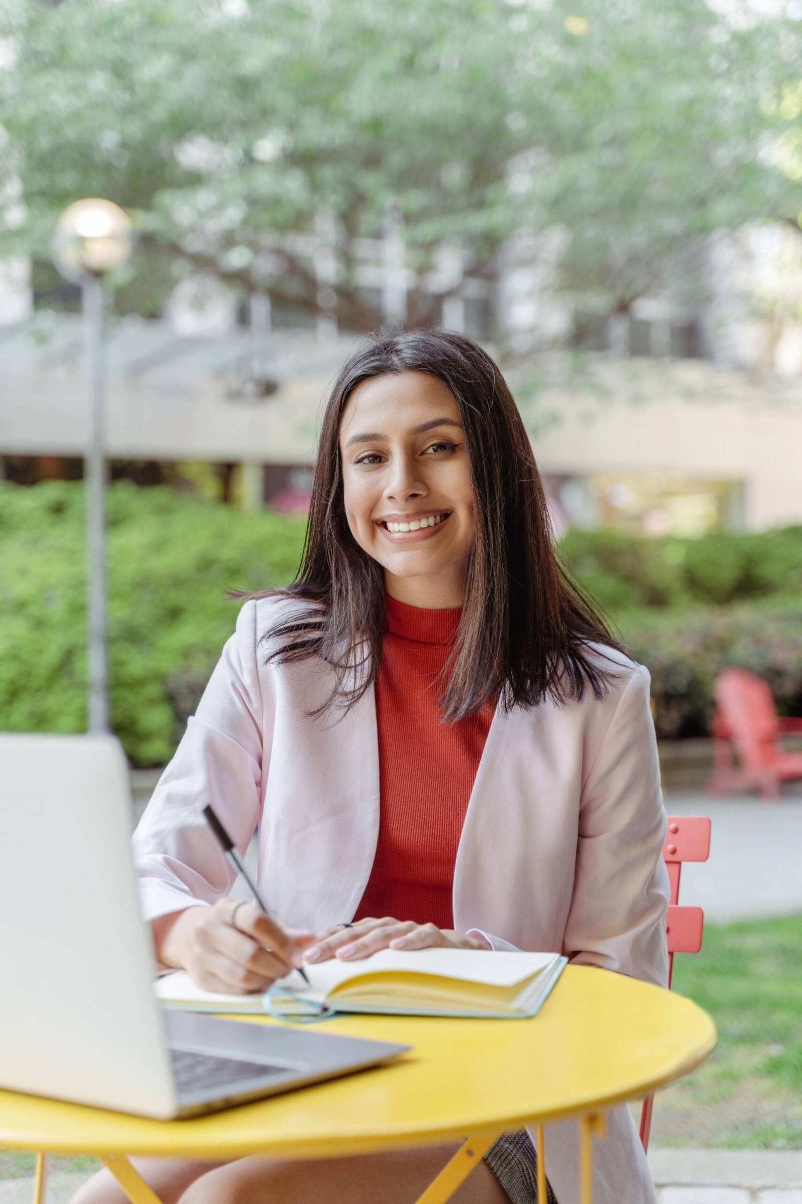 Vertical view happy smart businesswoman studying, learning language